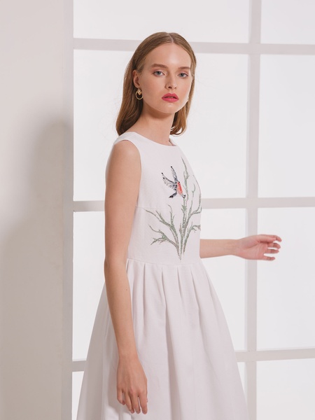 White dress with tit bird embroidery